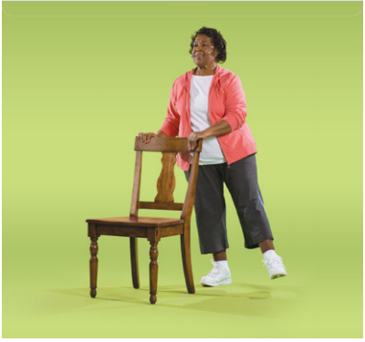 Woman demonstrating side leg raise